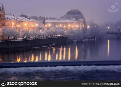 dawn view on Smetanovo Embankment and National Theatre in Prague, Czech Republic