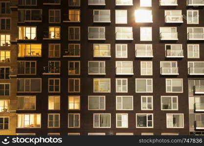 Day to night transition of a modern apartment building
