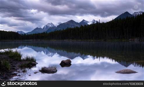 Daybreak at the beautiful Herbert Lake on a cloudy day, Icefield Parkway, Banff National Park, Alberta, Canada