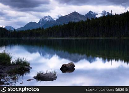 Daybreak at the beautiful Herbert Lake on a cloudy day, Icefield Parkway, Banff National Park, Alberta, Canada