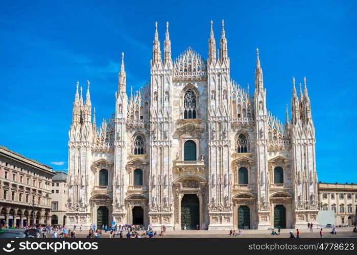 Daytime view of famous Milan Cathedral (Duomo di Milano) on piazza in Milan, Italy