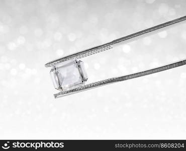 Dazzling diamond held in tweezers on a bokeh background