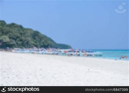 De-focused of white sand beach and sea background
