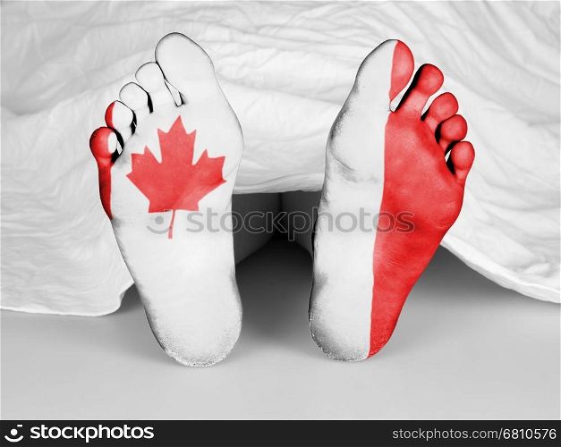 Dead body under a white sheet, flag of Canada