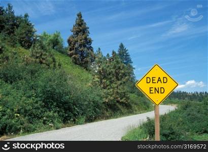 Dead End Sign Under A Clear Blue Sky In The Country