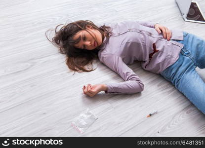 Dead woman on the floor after commiting suicide