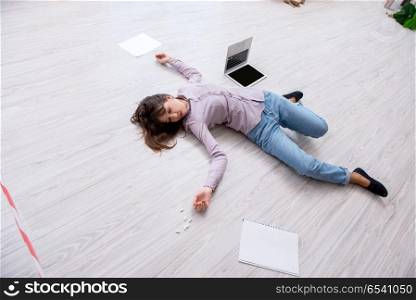 Dead woman on the floor after commiting suicide