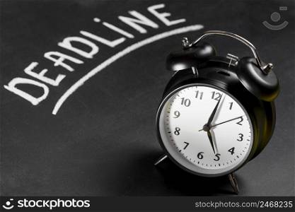 deadline text written chalkboard with alarm clock