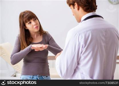 Deaf-mute female patient visiting young male doctor