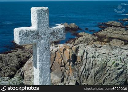 Death Coast with cross of dead fishermen in Galicia