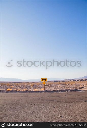 Death Valley, California. Direction sign in the middle of the desert.