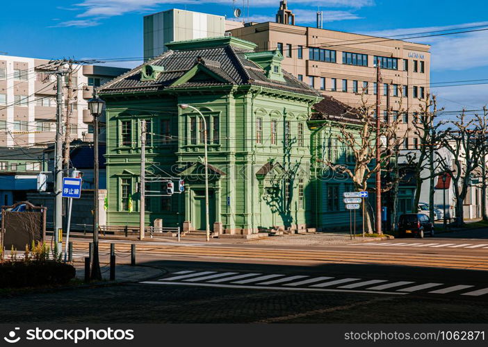 DEC 2, 2018 Hakodate, JAPAN - Hakodate Hokkaido Vintage green historic European style building in old town under beautiful winter sun