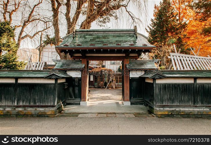 DEC 3, 2018 Kakunodate, Japan - Kakunodate old Samurai town famous vintage Edo village house gate with pine tree. Akita, Tohoku region