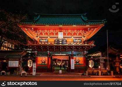 DEC 4, 2018 Tokyo, Japan - Kanda Myojin Shrine ancient main entrance gate grow in the dark at night. Most famous shrine to pray for success