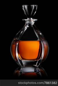 Decanter of cognac on a black background