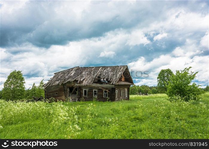 Decaying house in a non-existent village Burdovo, Kostroma oblast, Russia.