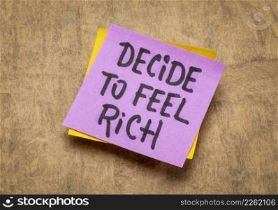decide to feel rich - inspirational advice or reminder note, positive mindset and personal development concept