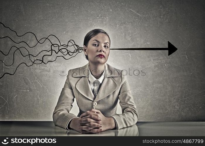 Decision making ability. Young pensive businesswoman and arrows coming out of her head