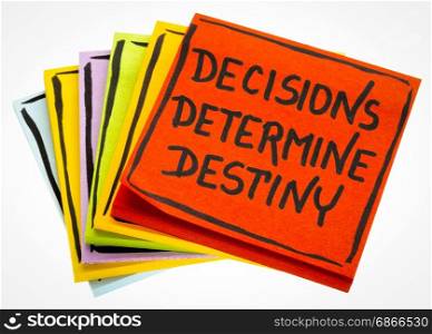 decisions determine destiny reminder - handwriting in black ink on an isolated sticky note