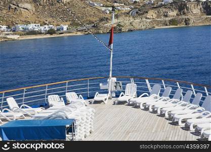 Deck chairs on boat deck, Mykonos, Cyclades Islands, Greece