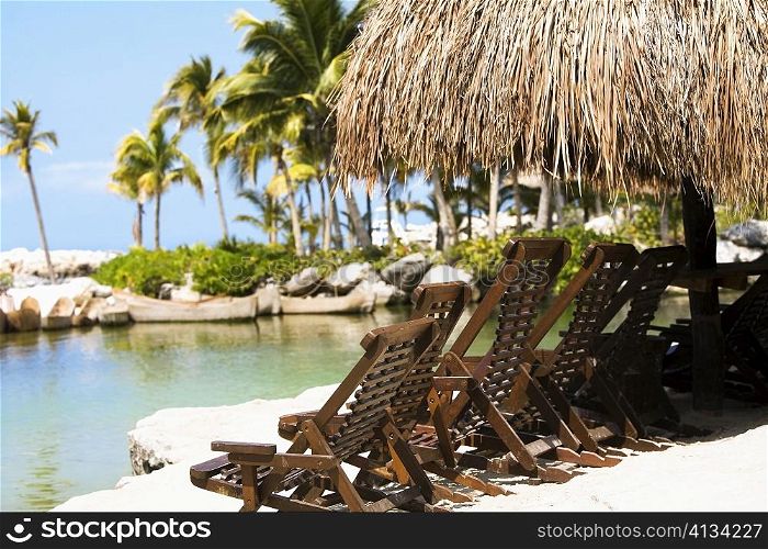 Deck chairs on the beach, Cancun, Mexico