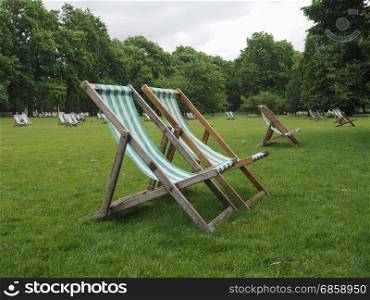 deckchairs in a park. deckchairs in a park in London city centre