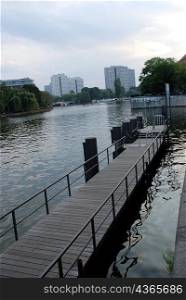 Decking leading out to river, Berlin