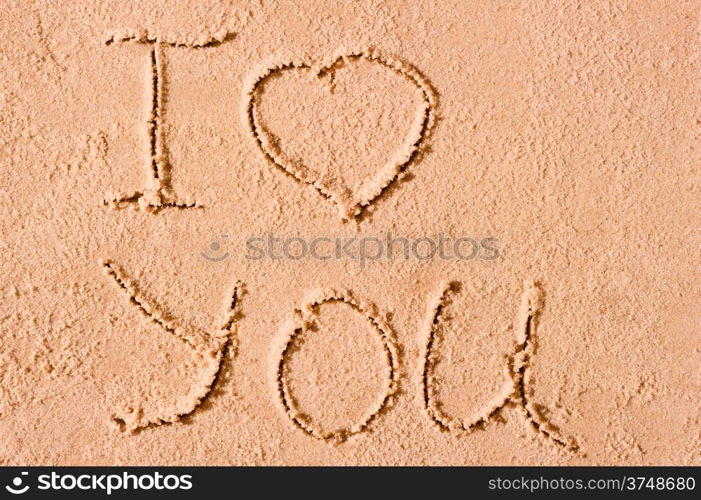 Declaration of love on the beach by the sea