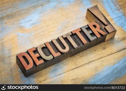 declutter exclamation - word in vintage letterpress wood type printing blocks stained by color inks