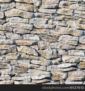 Decor seamless stone wall texture. Decor seamless stone wall texture. Detailed grunge background. Decor seamless stone wall texture