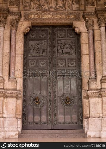 Decorataive carved door in Paris France