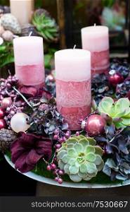 Decorated advent wreath with purple candles close up. Decorated advent candles