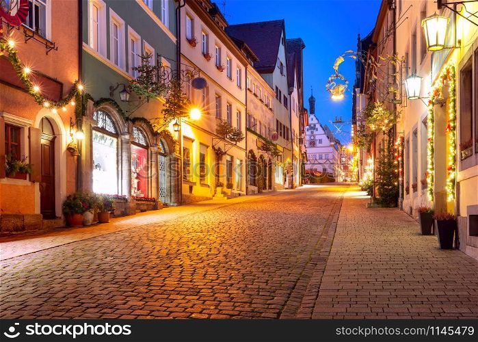 Decorated and illuminated Christmas street and Market square in medieval Old Town of Rothenburg ob der Tauber, Bavaria, southern Germany. Christmas Rothenburg ob der Tauber, Germany