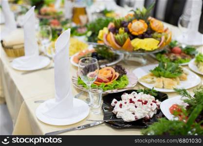 Decorated banquet wedding table setting on evening reception