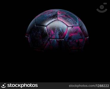 Decorated black textured football or soccer ball highlighted on black to emphasise the purple pentagonal pattern with copy space below