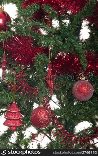 decorated christmas tree close-up background (typical green and red colors)