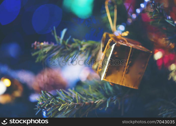 Decorated Christmas tree on blurred, sparkling and fairy background