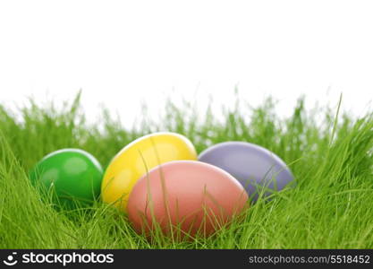 Decorated easter eggs in spring grass