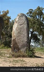 Decorated menhir in megalithic monument of Cromelech dos Almendres - Evora -Portugal