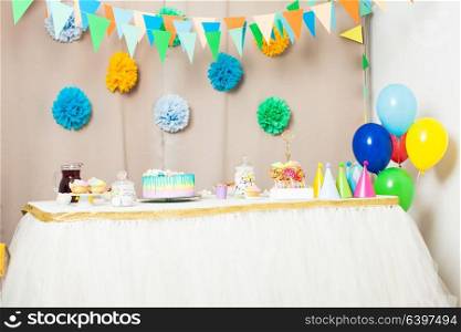 Decorated table in the room for Happy Birthday Party without people. Happy Birthday decoration