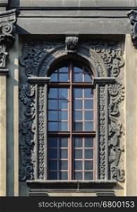 Decorated window with lattice, old building in Lviv (Lvov), Ukraine