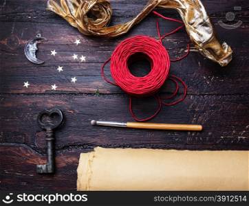 Decoration elements for craft on old wooden table. Decorator workplace.Holiday background