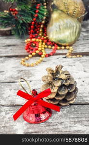 Decoration for the new year. pine cones on the background of snow-covered Christmas ornaments