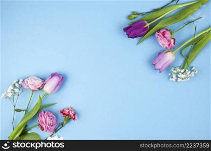 decoration made from variety flowers against blue backdrop