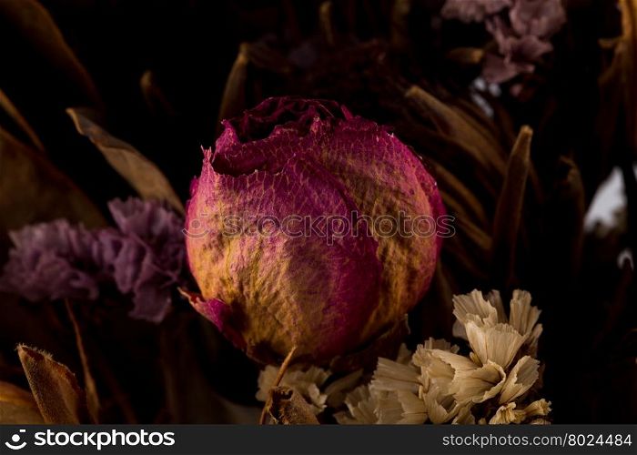 Decoration of dried flowers. Roses close up photo