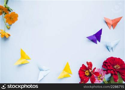 decoration with calendula marigold flowers origami paper butterflies
