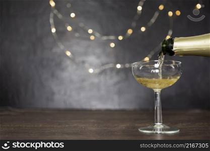 decoration with pouring champagne glass