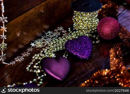 Decorations and ornaments for decorating the Christmas tree in a colorful Christmas composition,