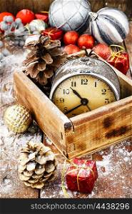 Decorations for Christmas. Happy New Year To 2017.Old vintage alarm clock in wooden box and Christmas decoration