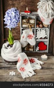 Decorations for Christmas. Wooden box with Christmas symbols and blooming hyacinth